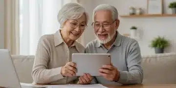 Senior couple happily reviewing 2025 Social Security benefits on tablet