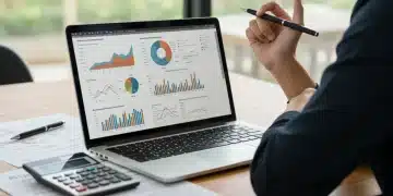 Thoughtful person planning student loan repayment strategies on a laptop in 2026